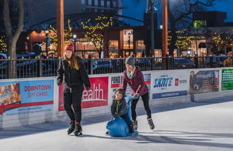 Residents skate on Acacia Park's ice rink for Skate in the Park.