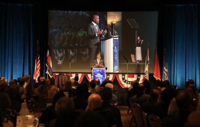 Mayor Yemi addresses the audience at the Broadmoor for his 2025 State of the City address.