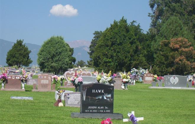 photo of gravestones and flowers at Evergreen Cemetery 